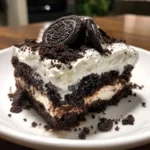 Oreo Poke Chocolate Cake – Moist, Decadent & Loaded with Cookies ‘n Cream Goodness!