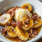 Delicious Banana Foster with Pecans and Caramel served in a bowl