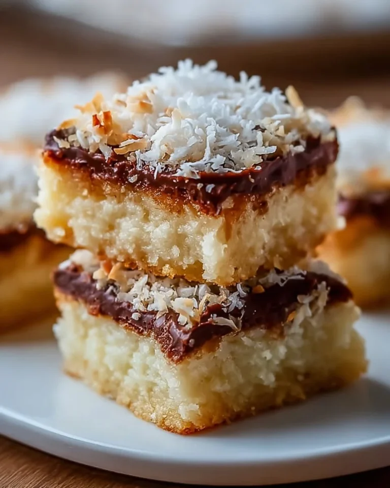 Delicious Coconut Dream Bars with a sweet coconut topping