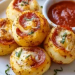 Plate of homemade pizza rolls, perfect for game day snacks and celebrations