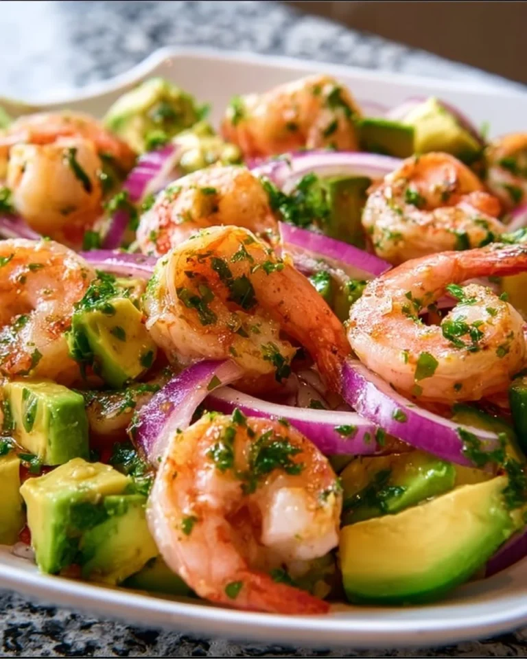 Zesty lime shrimp and avocado salad in a bowl with vibrant colors