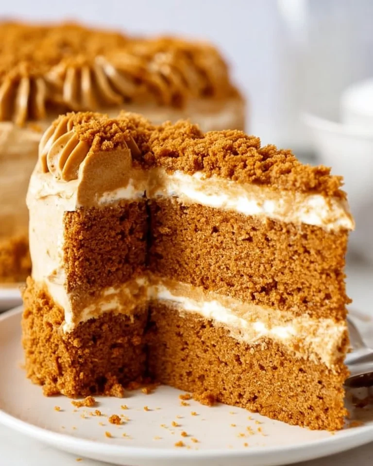 Delicious homemade Biscoff Cake topped with caramel and spices.