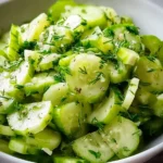 Crunchy cucumber celery salad with green apple, served in a bowl