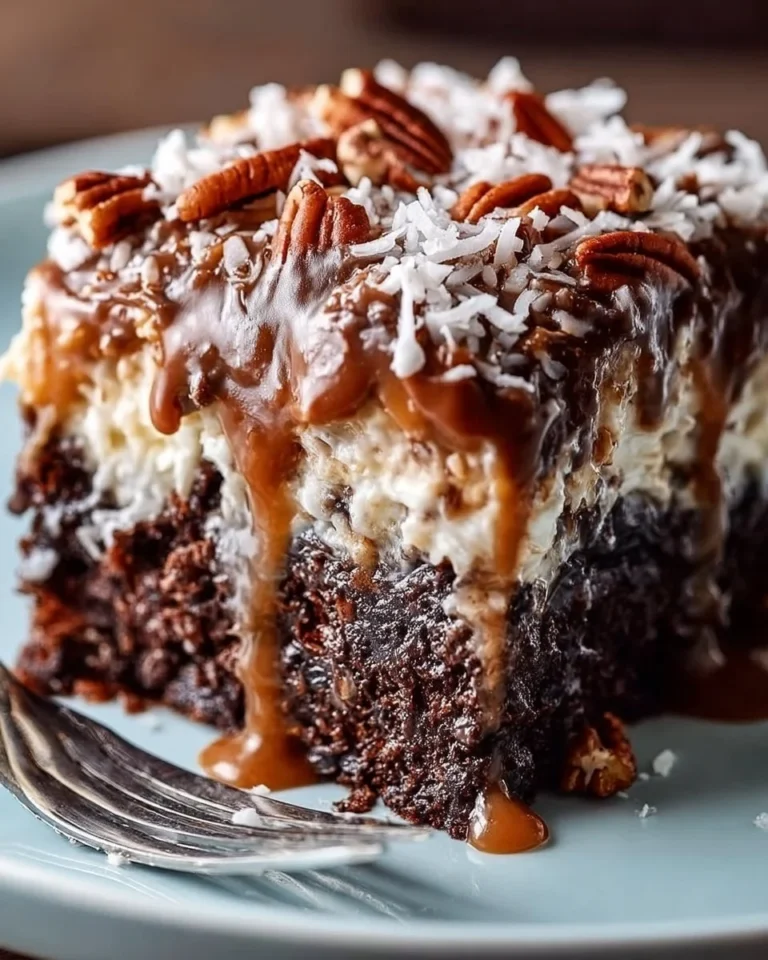 Delicious German Chocolate Poke Cake with coconut frosting and chocolate layers