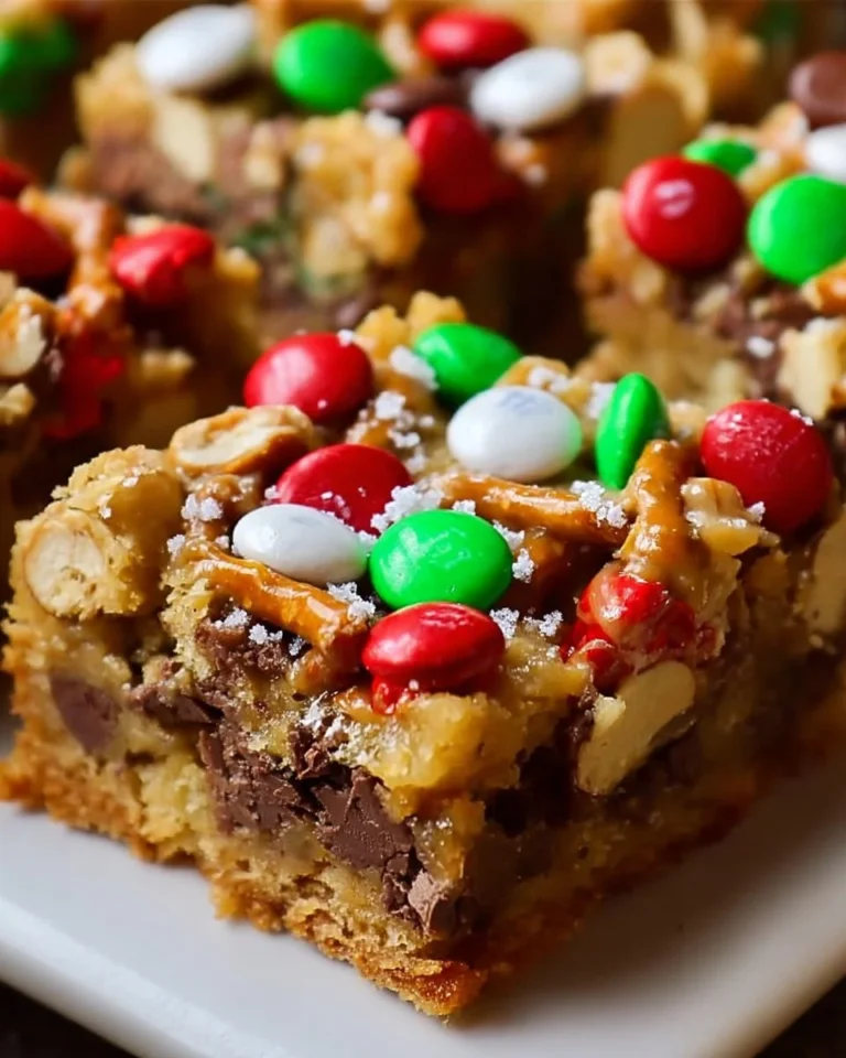 Plate of Santa's Trash Cookie Bars with festive decorations