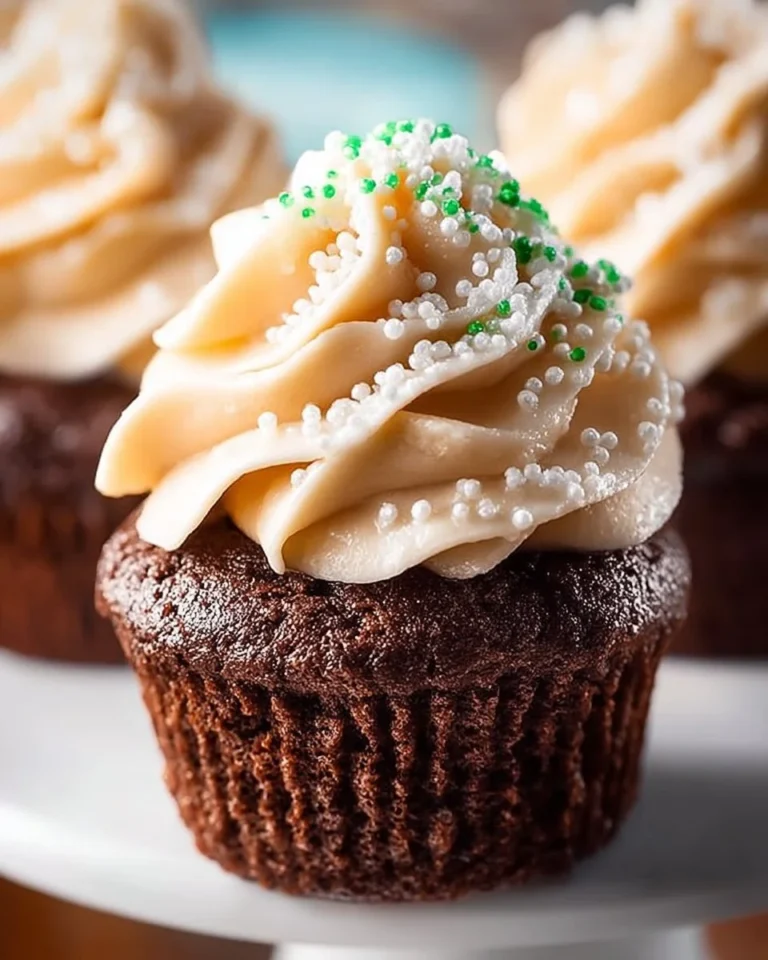 Delicious easy Irish cupcakes decorated with festive icing and sprinkles