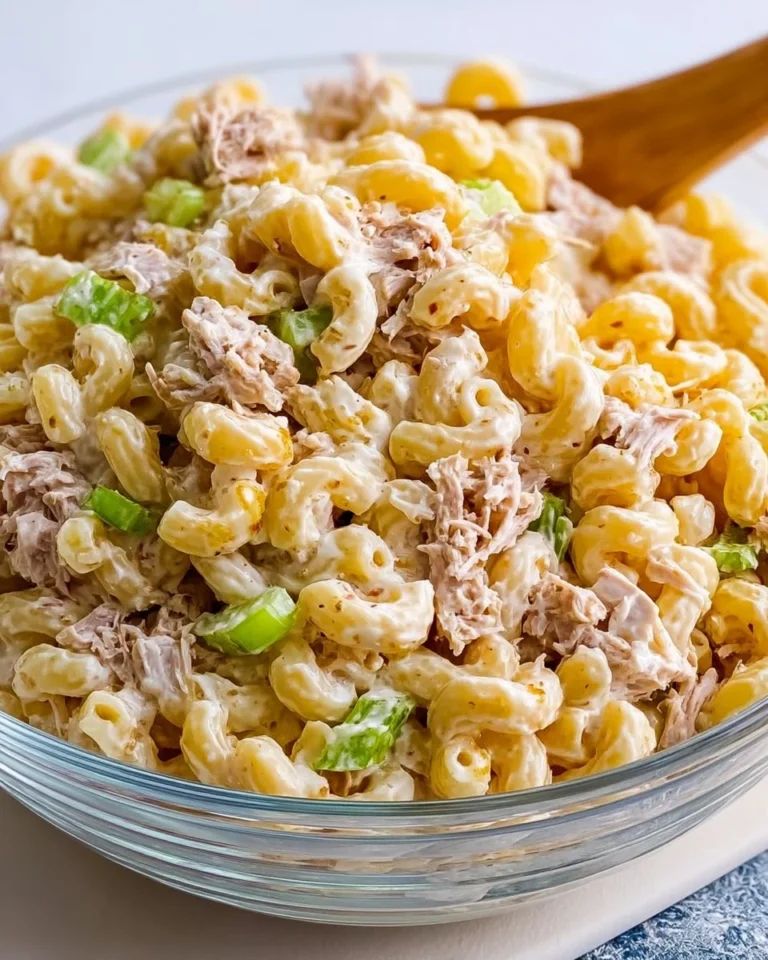 Bowl of easy tuna macaroni salad with vegetables and dressing