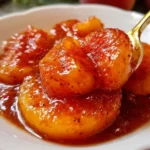Jar of fresh peach BBQ sauce with ingredients in the background