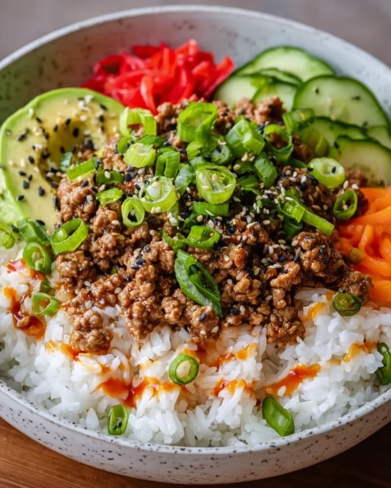 Healthy ground turkey rice bowl with vegetables and spices