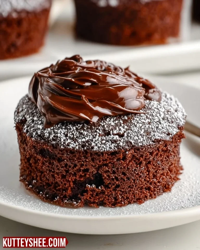Delicious mini chocolate cakes topped with chocolate frosting