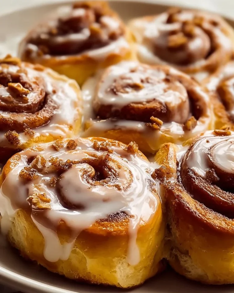 Fluffy one hour cinnamon rolls ready to be enjoyed fresh out of the oven.