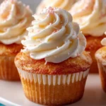 Small batch vanilla cupcakes topped with creamy frosting