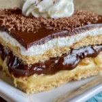 No-Bake Chocolate Eclair Cake topped with rich chocolate icing